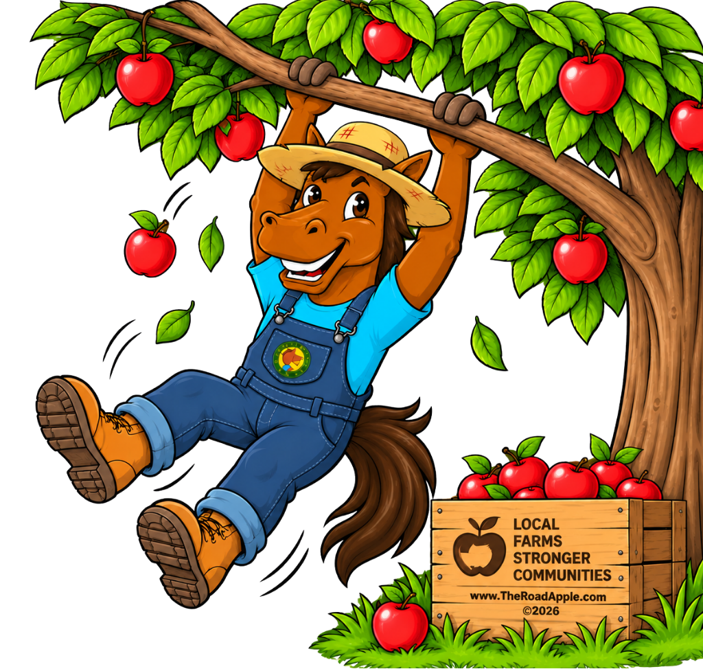The Road Apple Company horse mascot hanging from an apple tree